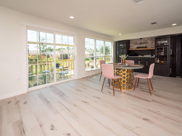 15 Brandywine Ln, Little Rock, AR 72227 - dining area featuring wood finished floors and recessed lighting