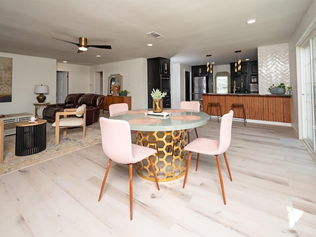 15 Brandywine Ln, Little Rock, AR 72227 - dining room with light wood-style floors, recessed lighting, and a ceiling fan