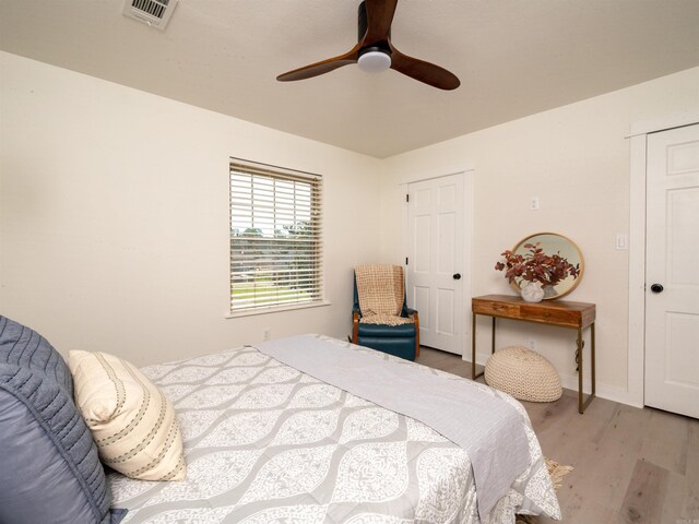 15 Brandywine Ln, Little Rock, AR 72227 - bedroom featuring wood finished floors, ceiling fan, and baseboards