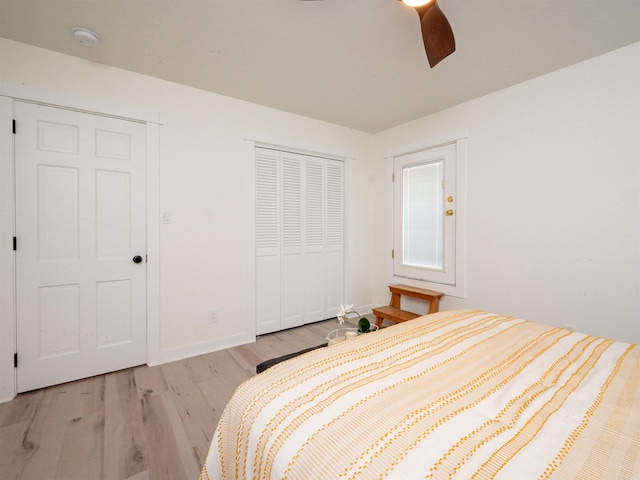 15 Brandywine Ln, Little Rock, AR 72227 - bedroom with light wood finished floors, a closet, baseboards, and ceiling fan