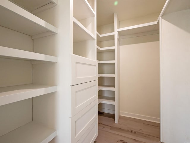 15 Brandywine Ln, Little Rock, AR 72227 - spacious closet featuring light wood-style floors