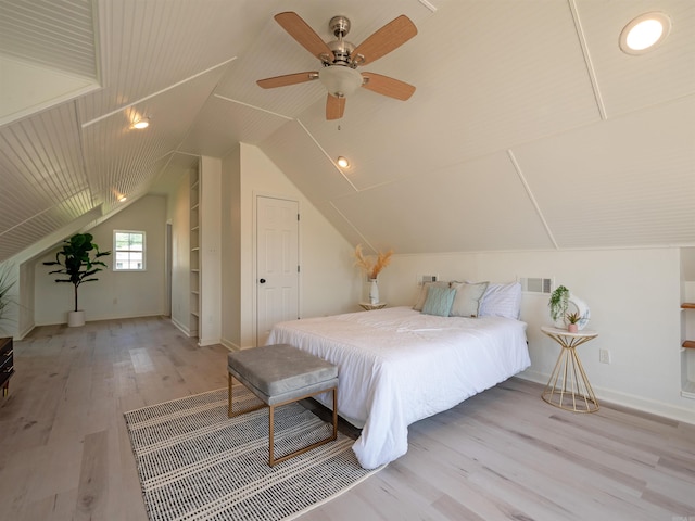 15 Brandywine Ln, Little Rock, AR 72227 - bedroom with light wood-type flooring, vaulted ceiling, baseboards, and a ceiling fan