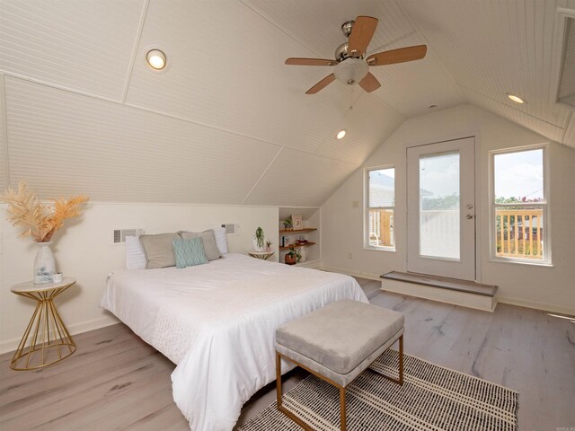 15 Brandywine Ln, Little Rock, AR 72227 - bedroom featuring access to exterior, wood finished floors, lofted ceiling, baseboards, and a ceiling fan