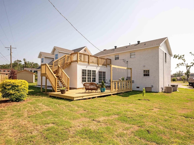 15 Brandywine Ln, Little Rock, AR 72227 - back of house with a wooden deck, a yard, central AC unit, and stairway