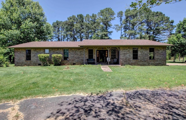 826 Carson Bridge Rd, Lonoke, AR 72086 - ranch-style house featuring brick siding and a front lawn