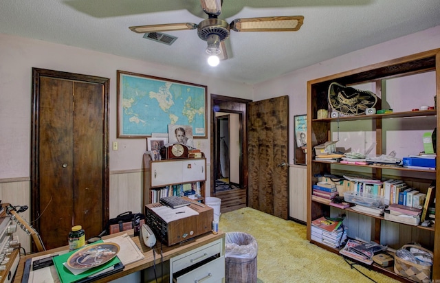 826 Carson Bridge Rd, Lonoke, AR 72086 - office space featuring carpet floors, ceiling fan, and a wainscoted wall