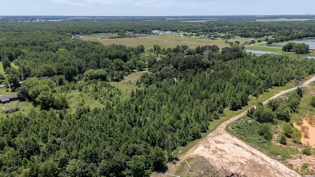 826 Carson Bridge Rd, Lonoke, AR 72086 - bird's eye view of a heavily wooded area and a nearby body of water