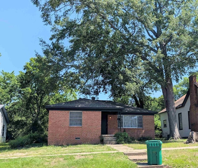 401 W S St, Benton, AR 72015 - view of front of home with brick siding, a front yard, and crawl space