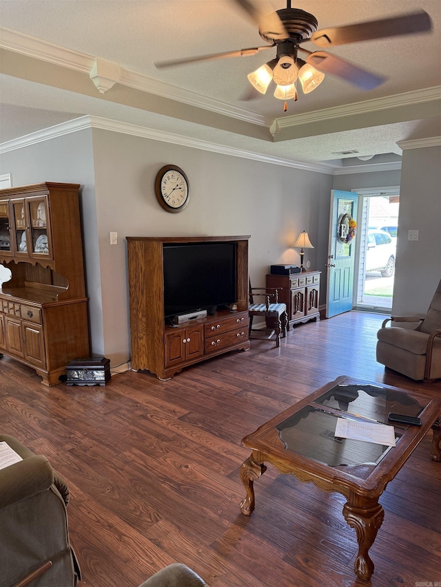 605 Shani Dr, Beebe, AR 72012 - living room featuring dark wood finished floors, crown molding, and a ceiling fan