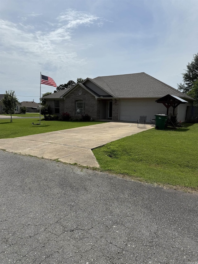 605 Shani Dr, Beebe, AR 72012 - ranch-style house featuring driveway, a front yard, an attached garage, and a shingled roof