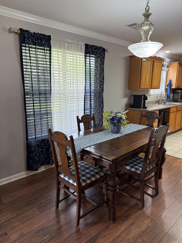 605 Shani Dr, Beebe, AR 72012 - dining room featuring ornamental molding and light wood-type flooring