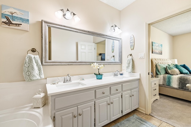 2806 Sundance Cir, Benton, AR 72015 - ensuite bathroom with double vanity, tile patterned flooring, and a bath
