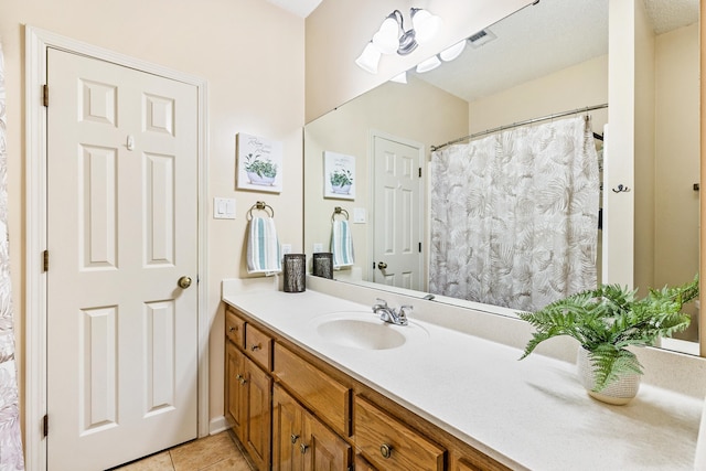 2806 Sundance Cir, Benton, AR 72015 - bathroom featuring vanity, tile patterned flooring, and a shower with shower curtain