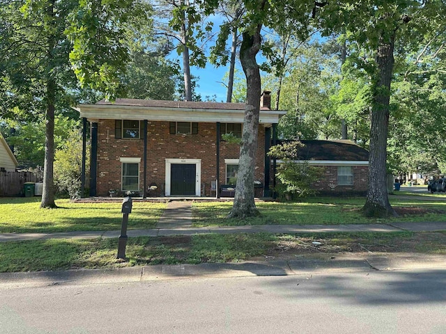 6625 Chateau Dr, Little Rock, AR 72209 - neoclassical home featuring a chimney and brick siding