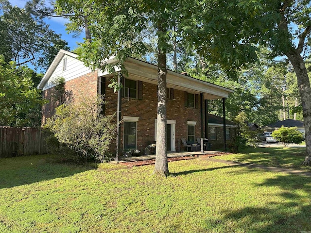 6625 Chateau Dr, Little Rock, AR 72209 - back of house featuring brick siding and a patio area