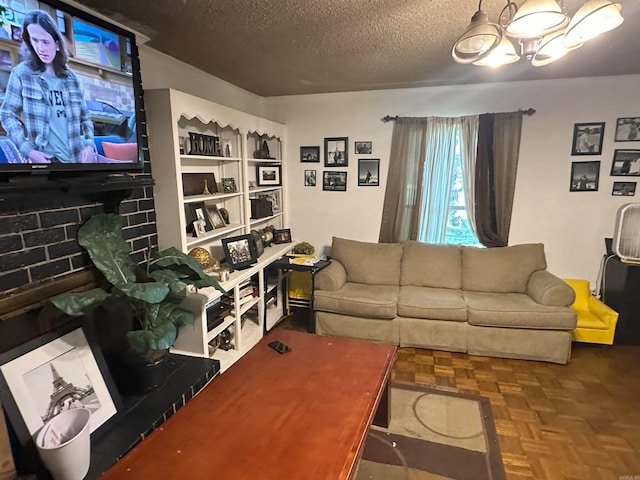 6625 Chateau Dr, Little Rock, AR 72209 - living room featuring a textured ceiling and a chandelier