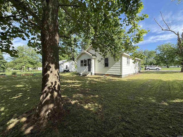 414 E 1st St, Rector, AR 72461 - view of yard featuring entry steps