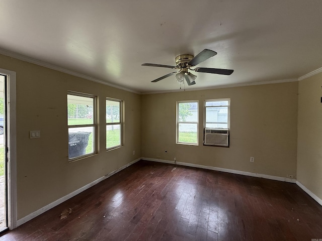 414 E 1st St, Rector, AR 72461 - empty room featuring dark wood finished floors, crown molding, baseboards, cooling unit, and ceiling fan