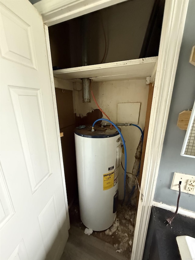 414 E 1st St, Rector, AR 72461 - utility room featuring water heater