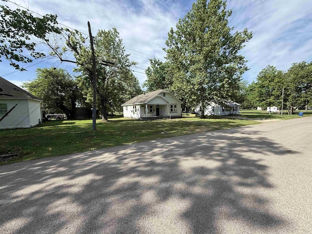 414 E 1st St, Rector, AR 72461 - view of front of property featuring a front yard