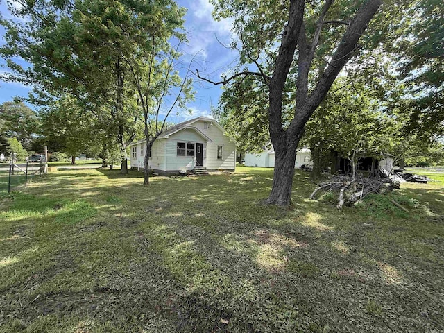 414 E 1st St, Rector, AR 72461 - view of grassy yard featuring entry steps