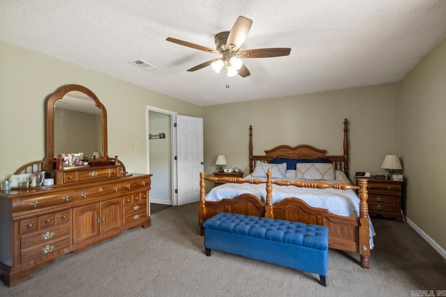 6221 Bray Dr, Benton, AR 72019 - carpeted bedroom featuring a ceiling fan, baseboards, and a textured ceiling
