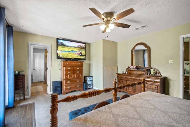 6221 Bray Dr, Benton, AR 72019 - bedroom featuring carpet, a textured ceiling, a ceiling fan, and baseboards