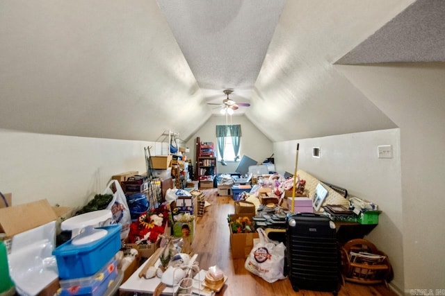 6221 Bray Dr, Benton, AR 72019 - bonus room featuring wood finished floors, vaulted ceiling, a ceiling fan, and a textured ceiling