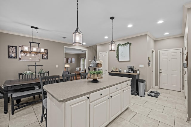 108 Chimney Rock Rd, Beebe, AR 72012 - kitchen featuring a kitchen island, recessed lighting, white cabinetry, light countertops, and light tile patterned flooring