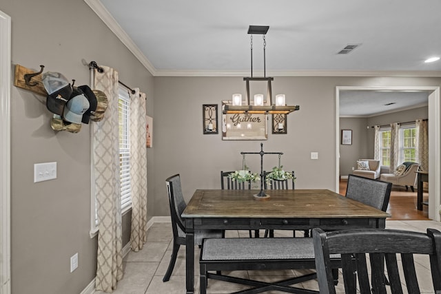 108 Chimney Rock Rd, Beebe, AR 72012 - dining room with ornamental molding, a chandelier, baseboards, and light tile patterned floors