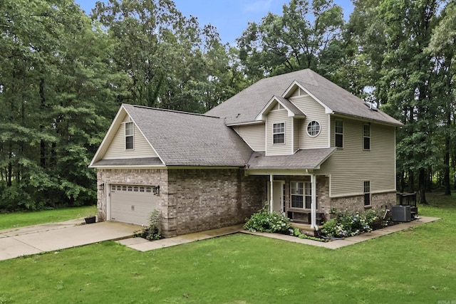 108 Chimney Rock Rd, Beebe, AR 72012 - view of front facade with brick siding, cooling unit, a front yard, and concrete driveway