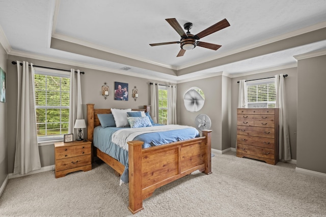 108 Chimney Rock Rd, Beebe, AR 72012 - bedroom featuring a tray ceiling, ornamental molding, multiple windows, and light colored carpet