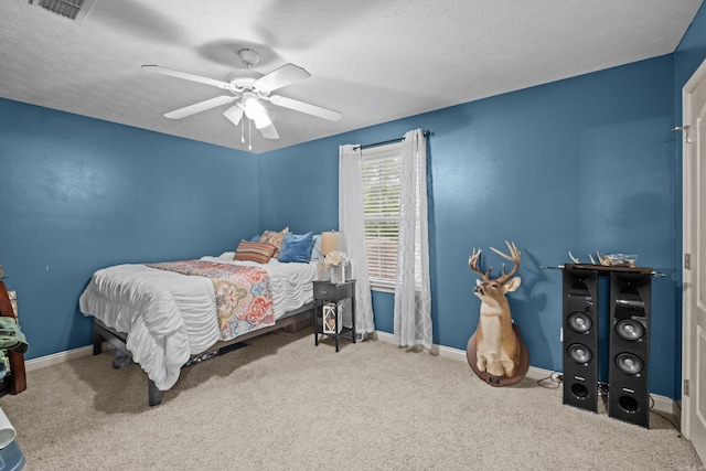 108 Chimney Rock Rd, Beebe, AR 72012 - bedroom featuring carpet floors, baseboards, a ceiling fan, and a textured ceiling