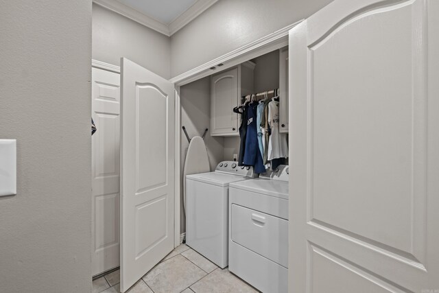 108 Chimney Rock Rd, Beebe, AR 72012 - laundry room with washer and dryer, cabinet space, ornamental molding, and light tile patterned flooring