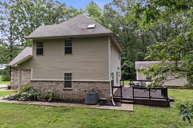 108 Chimney Rock Rd, Beebe, AR 72012 - view of property exterior with brick siding, a yard, and a deck