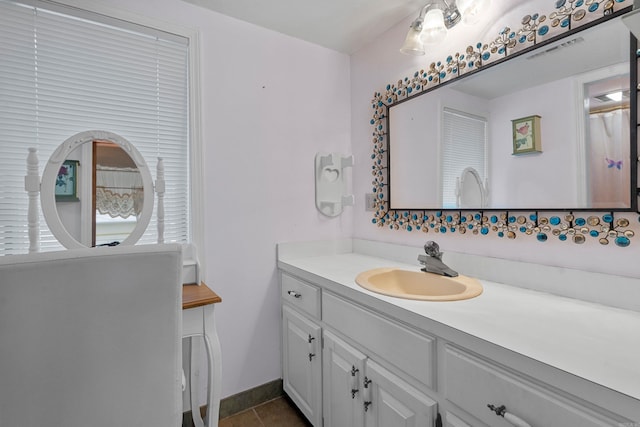 90 Silver Point Dr, Mount Ida, AR 71957 - bathroom featuring vanity, tile patterned flooring, and baseboards