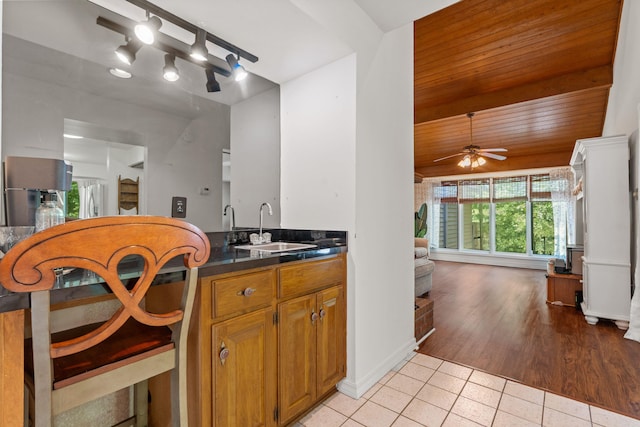 90 Silver Point Dr, Mount Ida, AR 71957 - kitchen with a sink, light tile patterned flooring, open floor plan, wooden ceiling, and ceiling fan