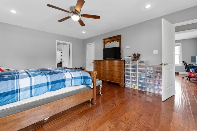 219 W D Ave, North Little Rock, AR 72116 - bedroom with recessed lighting, wood finished floors, a ceiling fan, and a desk