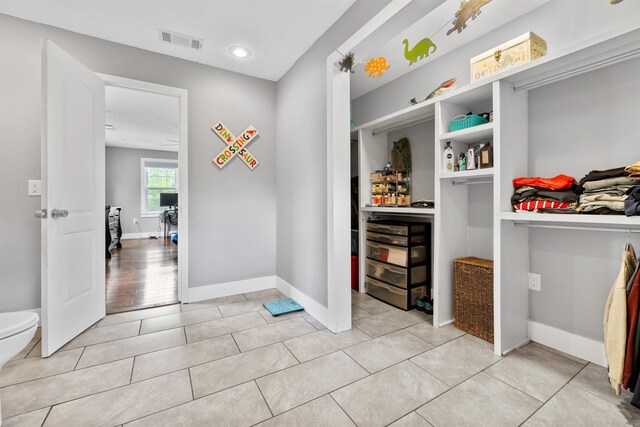 219 W D Ave, North Little Rock, AR 72116 - interior space featuring baseboards, light tile patterned flooring, and recessed lighting