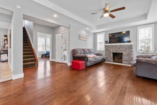 219 W D Ave, North Little Rock, AR 72116 - living area with stairway, ceiling fan, wood finished floors, a fireplace, and recessed lighting