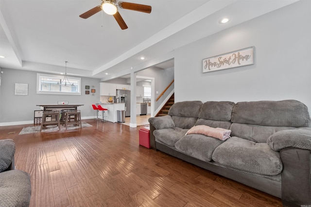 219 W D Ave, North Little Rock, AR 72116 - living room featuring baseboards, a ceiling fan, wood finished floors, a tray ceiling, and recessed lighting