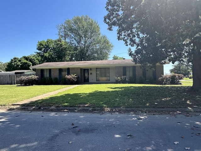 213 S Adcock, Dumas, AR 71639 - single story home with brick siding