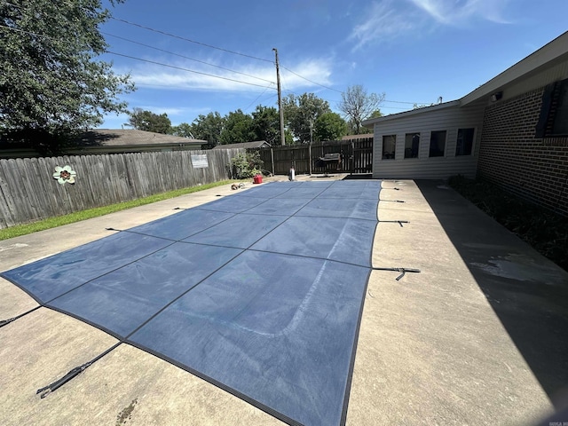 213 S Adcock, Dumas, AR 71639 - view of swimming pool with a fenced backyard and a patio