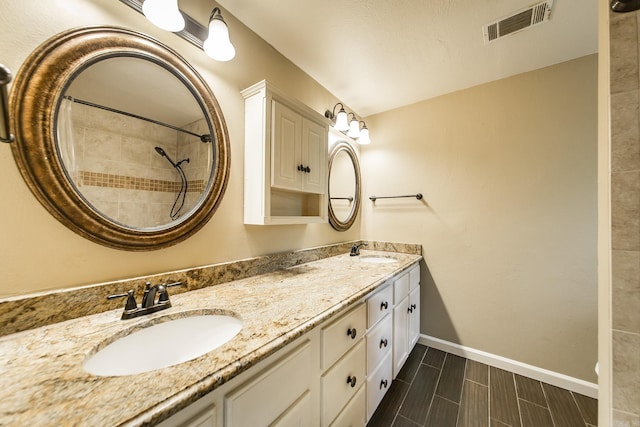 21221 Unicorn Ln, Roland, AR 72135 - full bath featuring double vanity and baseboards