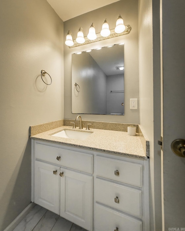 21221 Unicorn Ln, Roland, AR 72135 - bathroom featuring vanity and marble finish flooring