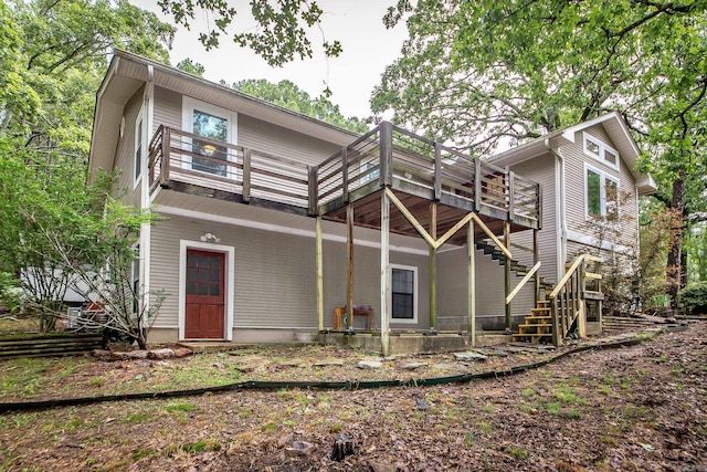 21221 Unicorn Ln, Roland, AR 72135 - rear view of house with stairway and a deck
