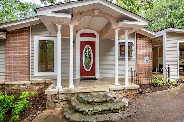 21221 Unicorn Ln, Roland, AR 72135 - entrance to property with a porch and brick siding