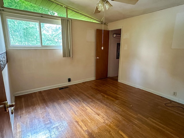 33 W Lakeshore Dr, Cherokee Village, AR 72529 - unfurnished room with ceiling fan, hardwood / wood-style flooring, vaulted ceiling, and baseboards