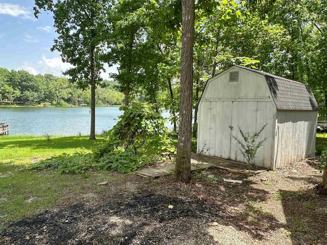 33 W Lakeshore Dr, Cherokee Village, AR 72529 - view of shed featuring a water view and a view of trees
