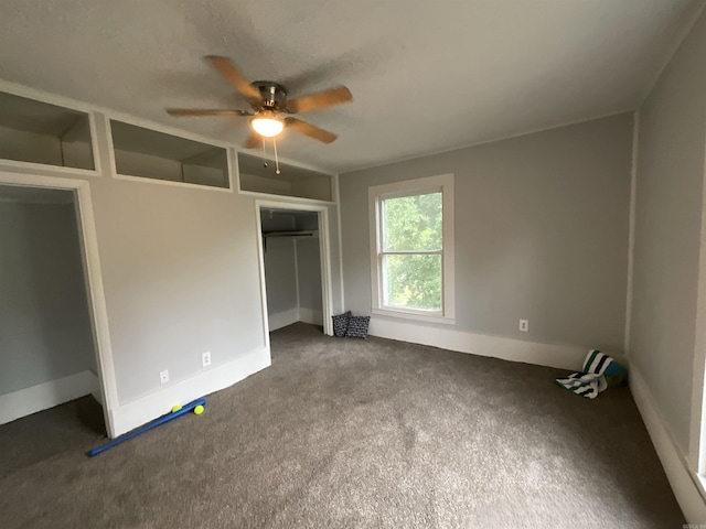 301 W Frazior, Linden, TX 75563 - unfurnished bedroom with a closet, carpet, baseboards, and ceiling fan